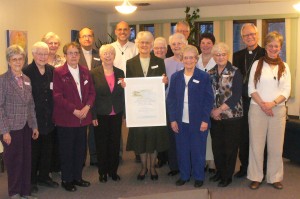 Nancy and Ted Wood with the Missionary Oblate Sisters (Sr. Cecile Fortier, Superior, centre) and Archbishop James Weisgerber