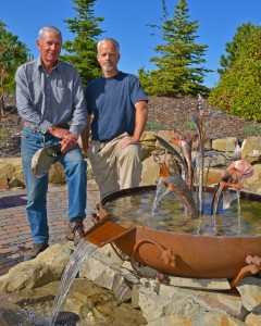 Mike Simpson, left, visionary behind the Sacred Garden; and Glen Lott, sculptor of the metal fountainhead
