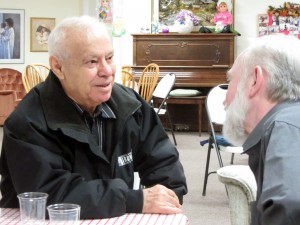 Eli (left) and Jeff; Developing friendships at a New Life Fellowship Dinner