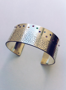 _How Down's Syndrome Made Me Kind__ silver cuff bracelet with gemstone sprinkles