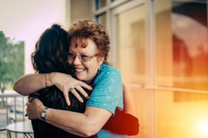 women hugging