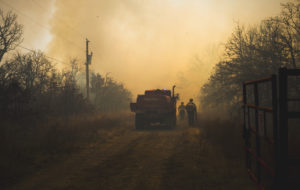 firefighters on country road