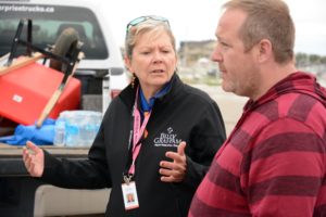 Fort Mac resident Martyn with chaplain Wanda Burchert. Photo by Frank King, BGEA Canada