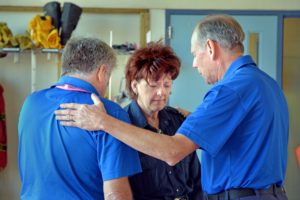 Firefighter Dana Allan with two RRT chaplains. Photo by Frank King, BGEA Canada