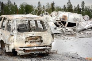 Incinerated cars in Fort McMurray. Photo by Frank King, BGEA Canada