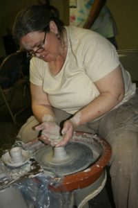 Kim Witt on the ceramics wheel