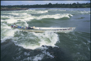 To reach remote villages in Brazil's Amazon region, travellers pass through turbulent waters that often conceal large rocks just below the surface. (Photo by Alan Hood)